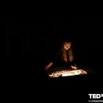 Ana Munteanu gives a speech and performs with a sand animation show at Ted x Chisinau in Chisinau, Republic of Moldova.